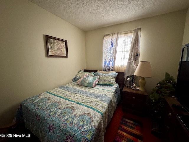 bedroom with a textured ceiling