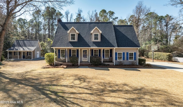 cape cod house with a porch