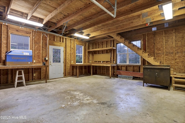 misc room with concrete flooring