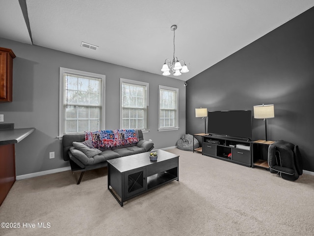 living room with lofted ceiling, light colored carpet, and a chandelier