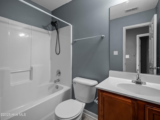 full bathroom featuring vanity, shower / bathing tub combination, and toilet