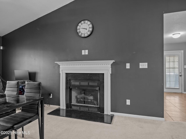 living room with vaulted ceiling and light carpet