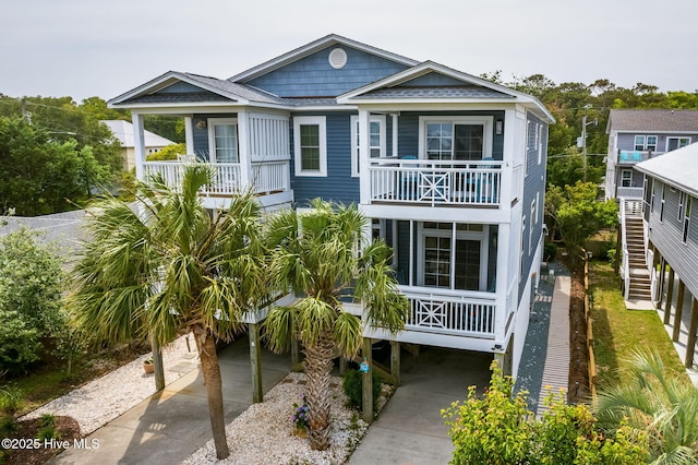 beach home with a carport and a balcony