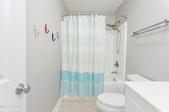 full bathroom featuring tile patterned flooring, vanity, shower / tub combo with curtain, and toilet