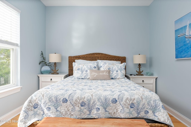 bedroom featuring hardwood / wood-style flooring