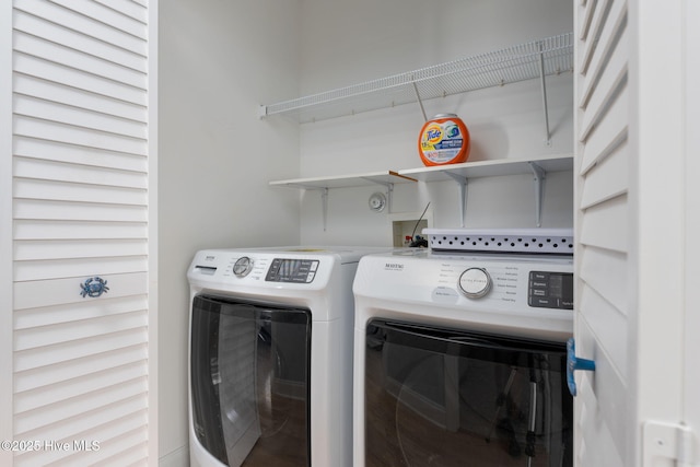 laundry room featuring washer and dryer