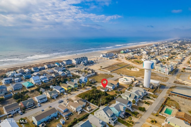 aerial view with a view of the beach and a water view