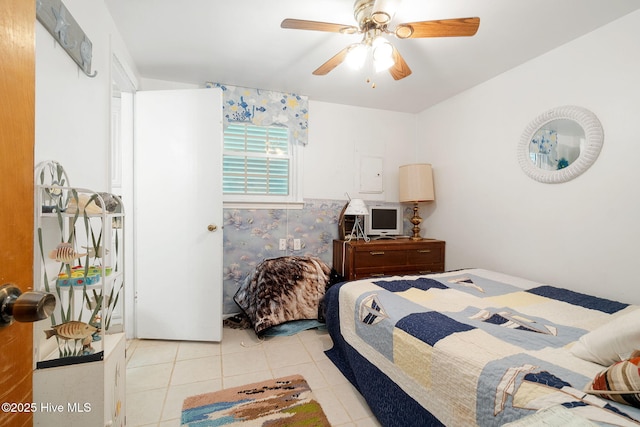 tiled bedroom with ceiling fan