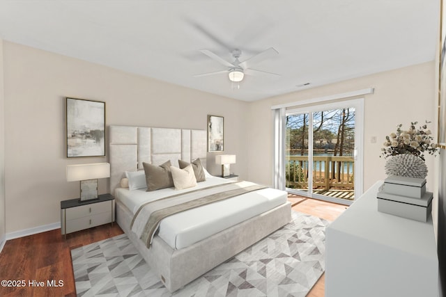 bedroom with access to exterior, wood-type flooring, and ceiling fan