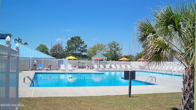 view of swimming pool featuring a gazebo and a patio area