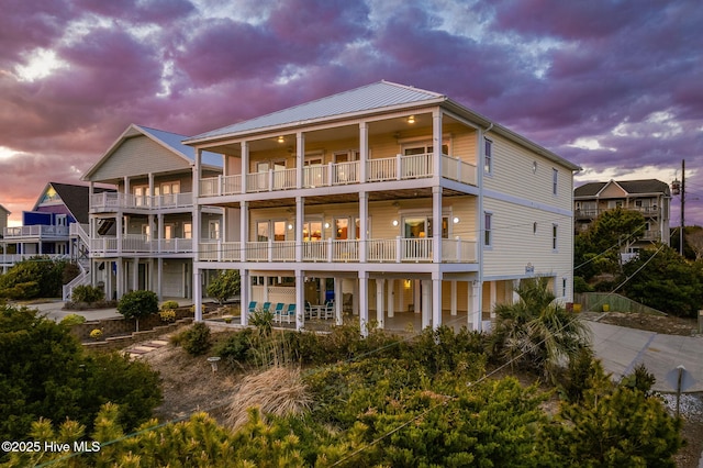 view of outdoor building at dusk