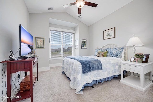 carpeted bedroom with a ceiling fan, visible vents, vaulted ceiling, and baseboards