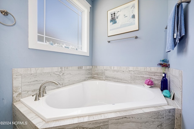 bathroom featuring a garden tub