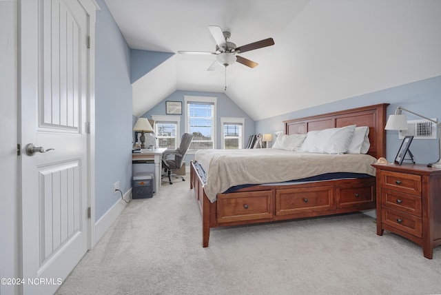 bedroom featuring baseboards, vaulted ceiling, a ceiling fan, and light colored carpet