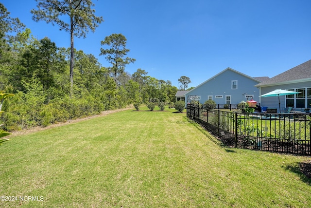 view of yard with fence