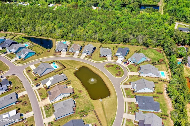 aerial view featuring a water view and a residential view