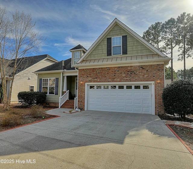 view of front of property featuring a garage