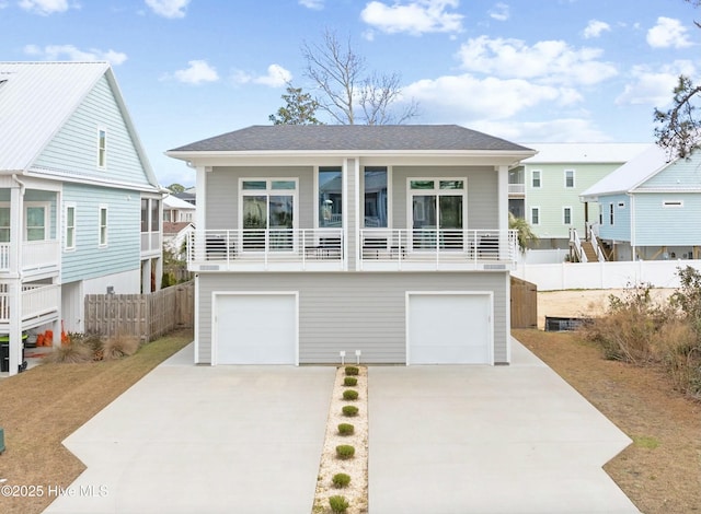 view of front of house featuring a garage and covered porch