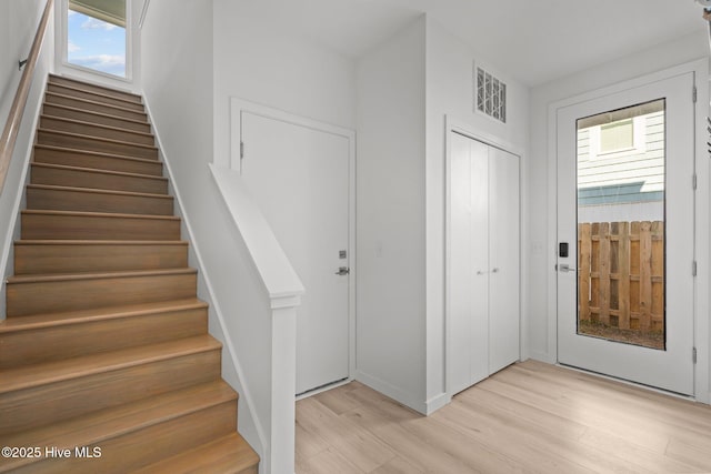 foyer entrance featuring light wood-type flooring