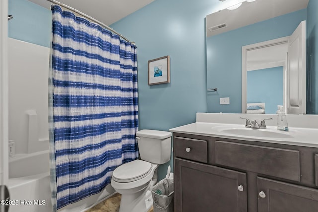 bathroom featuring vanity, toilet, visible vents, and shower / tub combo with curtain