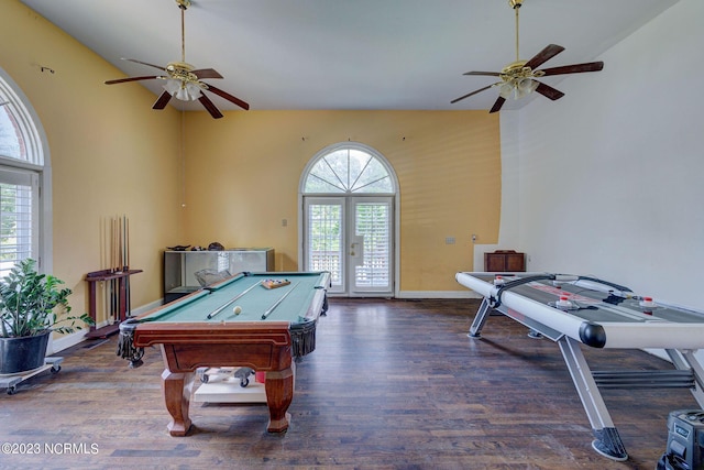 rec room featuring french doors, a healthy amount of sunlight, dark hardwood / wood-style flooring, and high vaulted ceiling