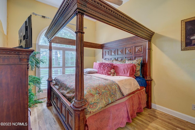 bedroom with light hardwood / wood-style floors