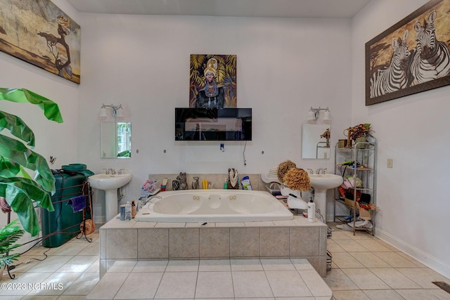 bathroom with tile patterned floors and tiled bath