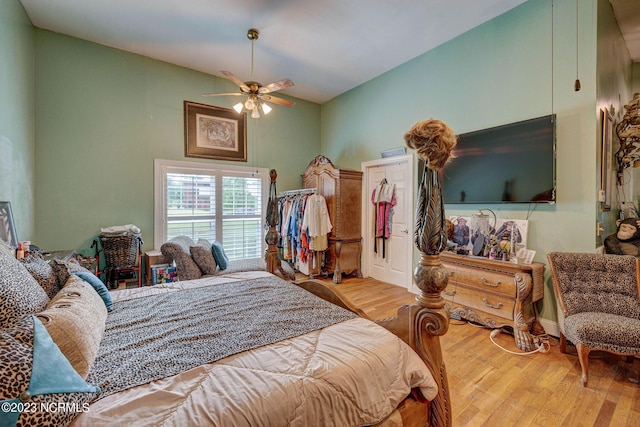 bedroom featuring ceiling fan and light wood-type flooring