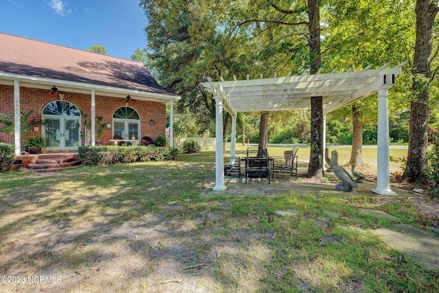 view of yard with a pergola