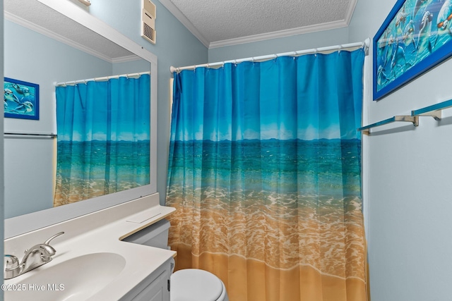 bathroom featuring ornamental molding, vanity, toilet, a textured ceiling, and a shower with shower curtain