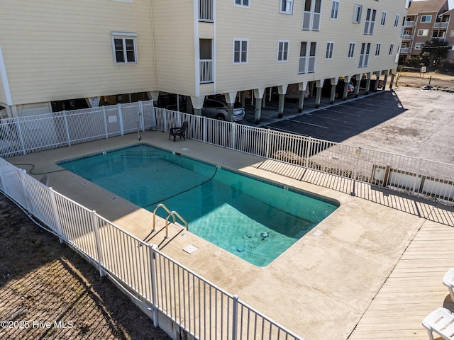 view of pool with a patio area