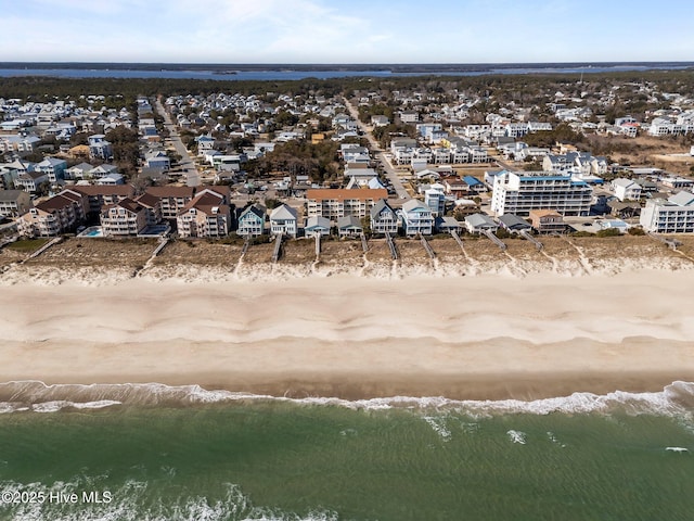 aerial view featuring a beach view and a water view