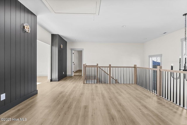 spare room featuring light hardwood / wood-style flooring