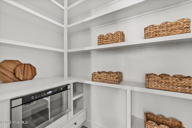 pantry featuring beverage cooler