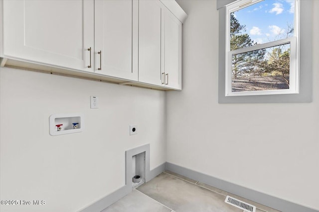 washroom with cabinets, electric dryer hookup, and washer hookup