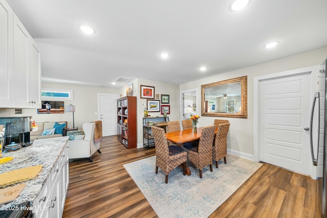 dining room featuring dark wood-type flooring