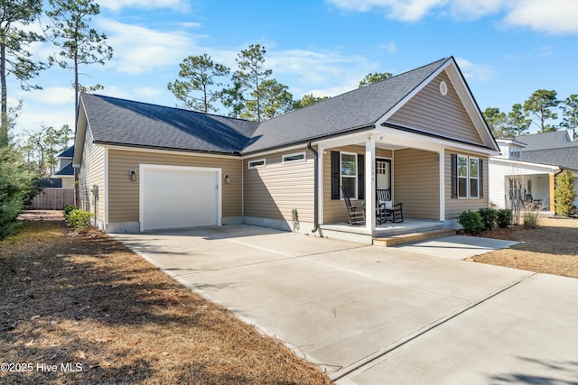 view of front of house with a garage and covered porch