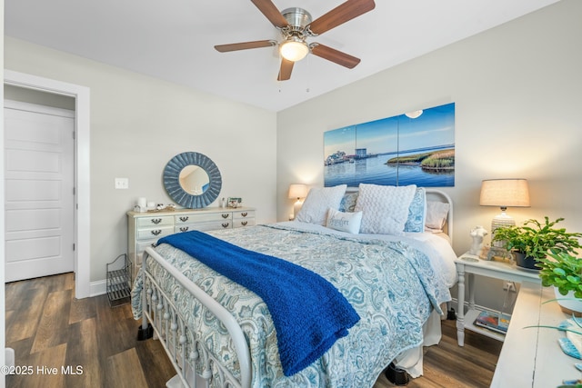 bedroom featuring ceiling fan and dark hardwood / wood-style flooring