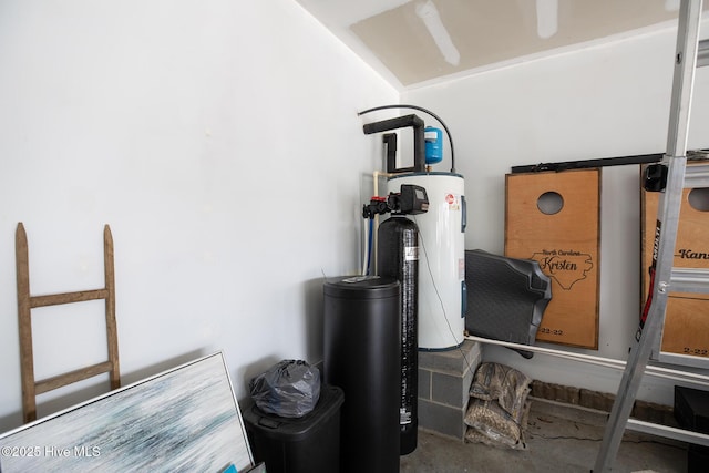 utility room featuring water heater