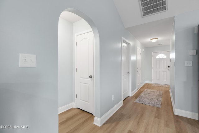 foyer with light wood-type flooring