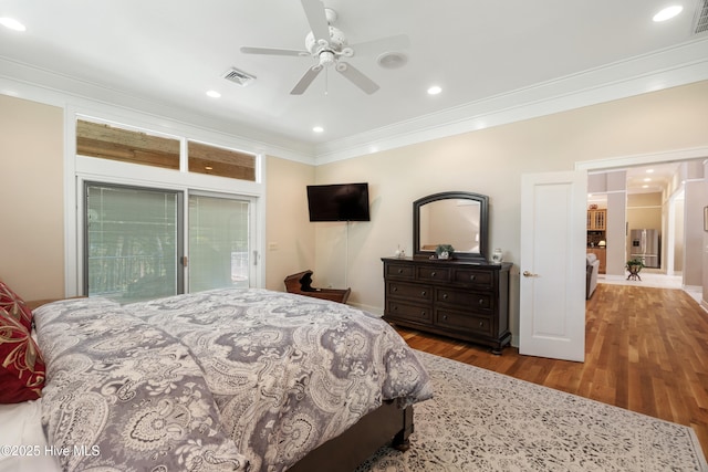 bedroom featuring crown molding, wood-type flooring, access to exterior, and ceiling fan