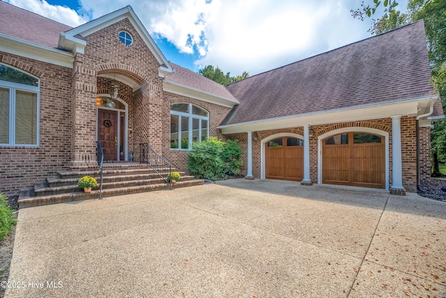 view of front of property with a garage