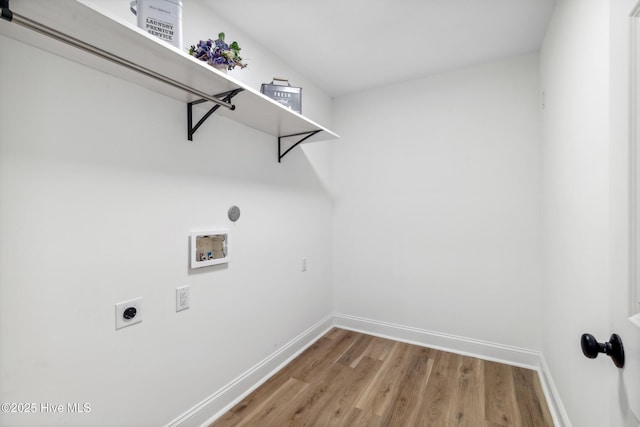 laundry room featuring electric dryer hookup, hardwood / wood-style floors, and hookup for a washing machine