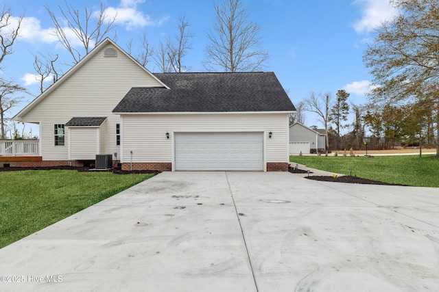 view of front of house with a garage and a front yard