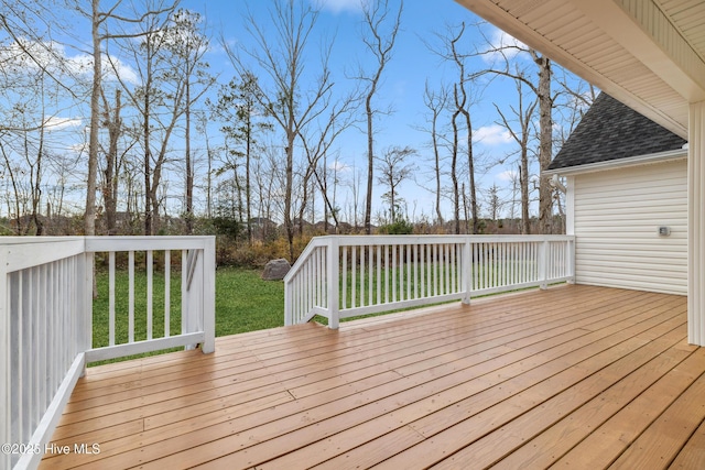 deck featuring a yard