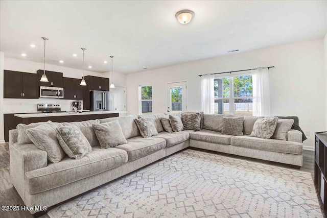 living room featuring light wood-type flooring