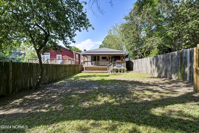 view of yard featuring a deck