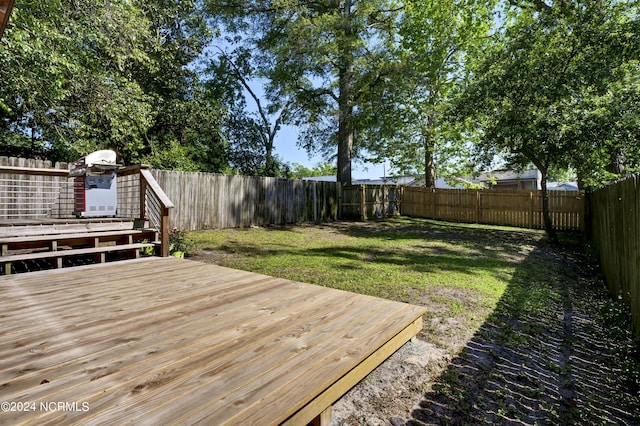 deck featuring a yard