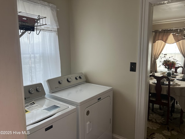 laundry room with washing machine and dryer