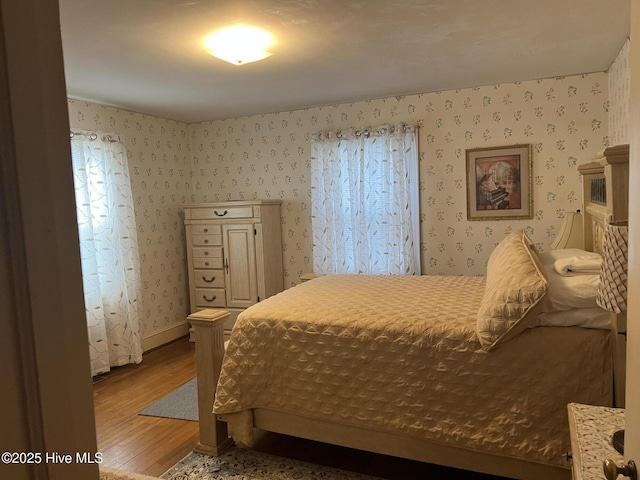 bedroom featuring wood-type flooring